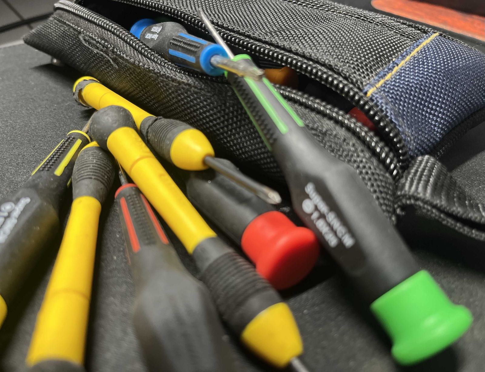A technician's screwdriver kit used for desktop and laptop repairs.